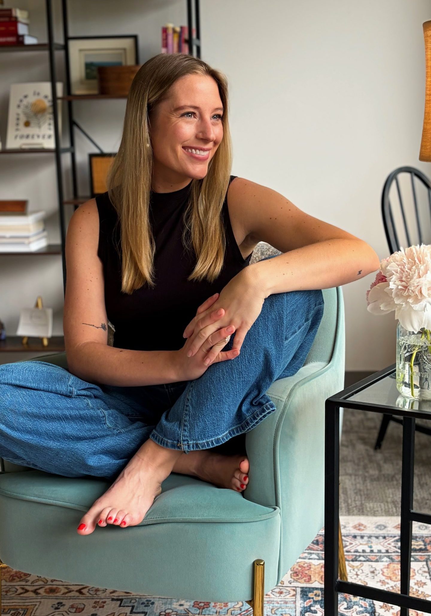 therapist with long hair facing to the right
